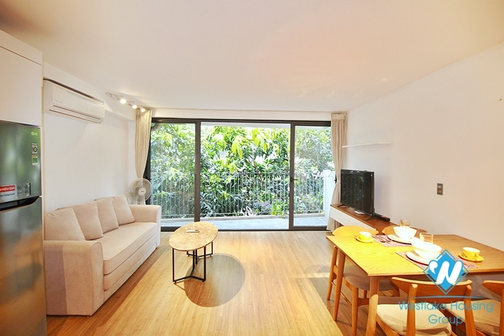 An elegant duplex 1 bedroom apartment  for rent on Xuan Dieu street